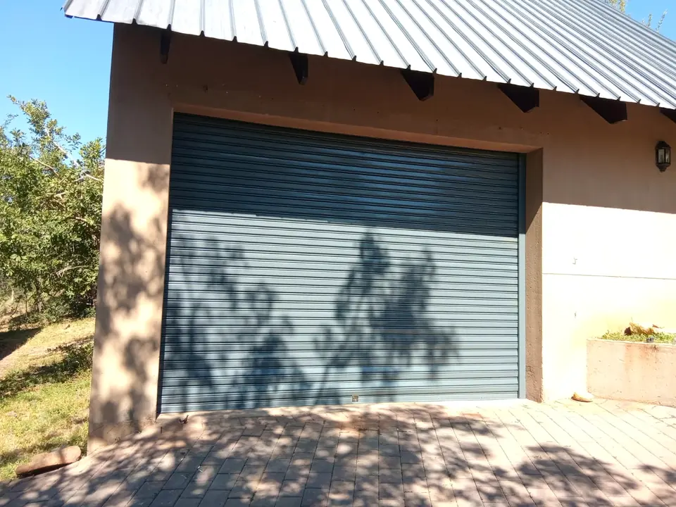 Grey roller door on a garage