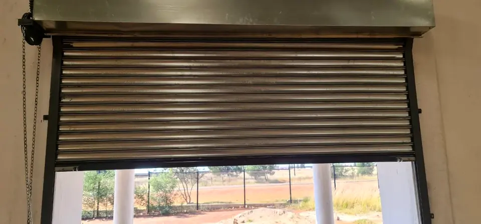 Roller shutter over a window opening